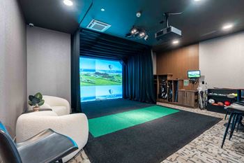 Game room with full-swing hd gold, hockey, football, & baseball simulator